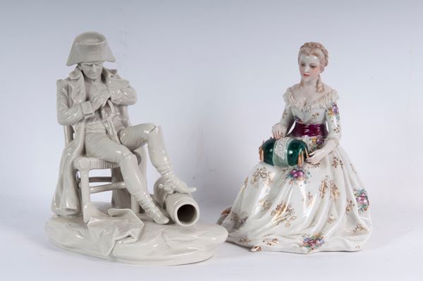 Lotto di due personaggi in porcellana policroma: