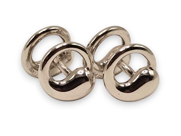 TIFFANY &amp; CO.&#174; - Collezione Elsa Peretti: coppia di gemelli "Eternal Circle" in platino.    