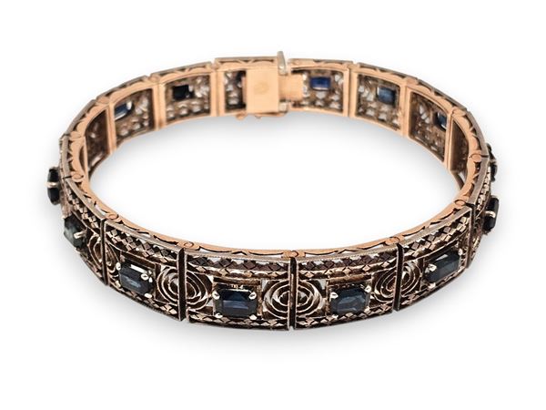 Bracciale a nastro in oro ed argento con zaffiri