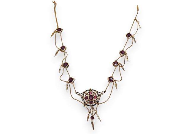 Collana in oro, granati e perle