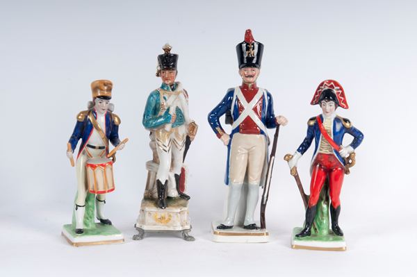 Lotto di quattro porcellane policrome