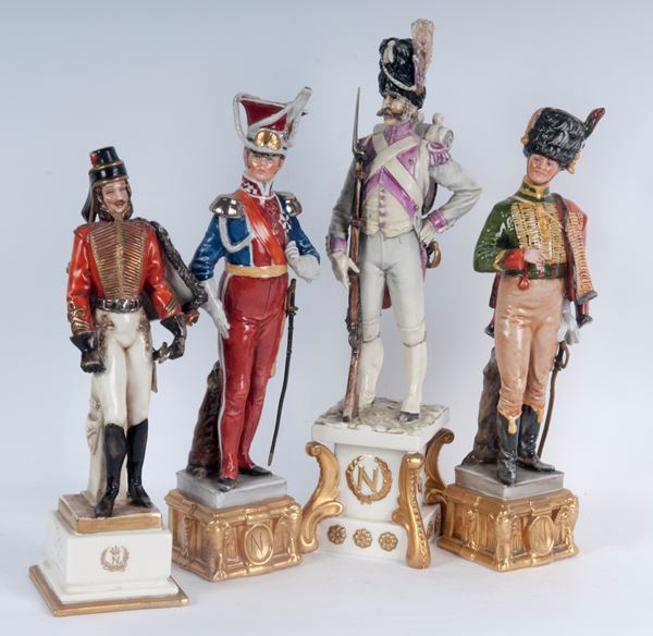 Lotto di quattro porcellane policrome