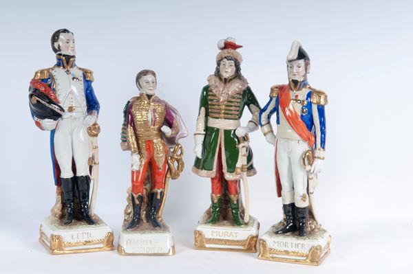 Lotto di quattro porcellane policrome