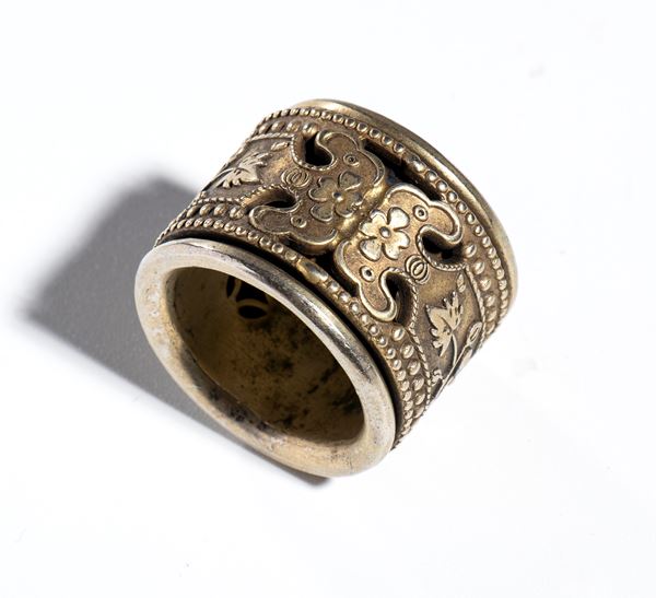 Bronze ring with floral carving, China
