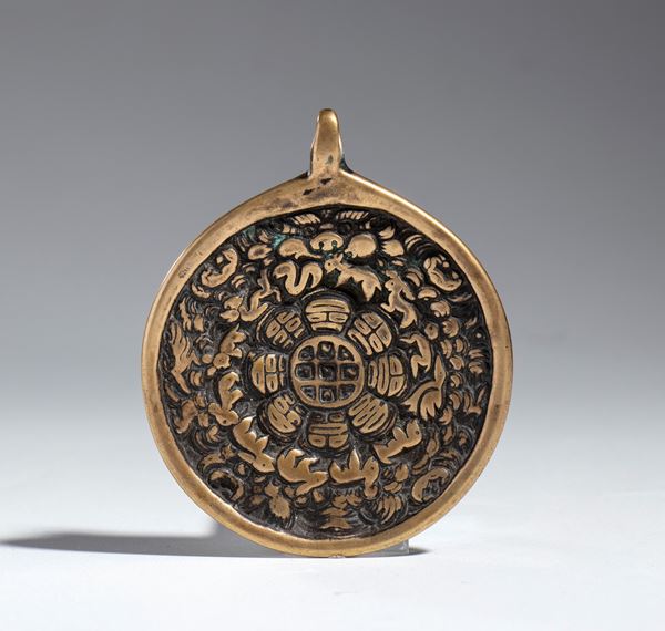 A pendant ornament decorated with Bagua and Jiugong in bound bronze, China