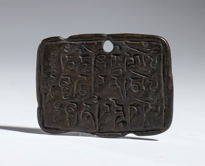 Amuleto buddista in bronzo legato, Cina