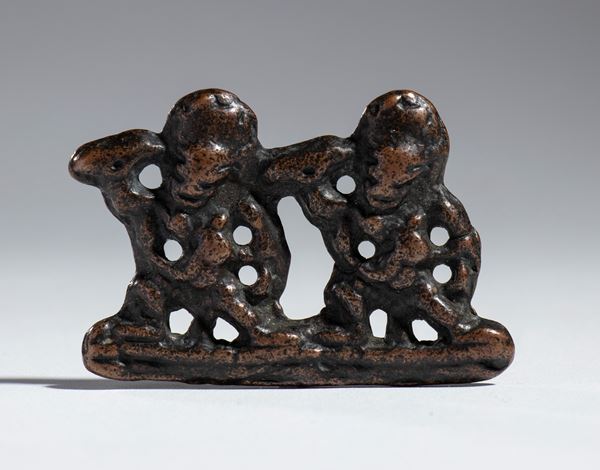 Buddhist amulet, in bound bronze, China