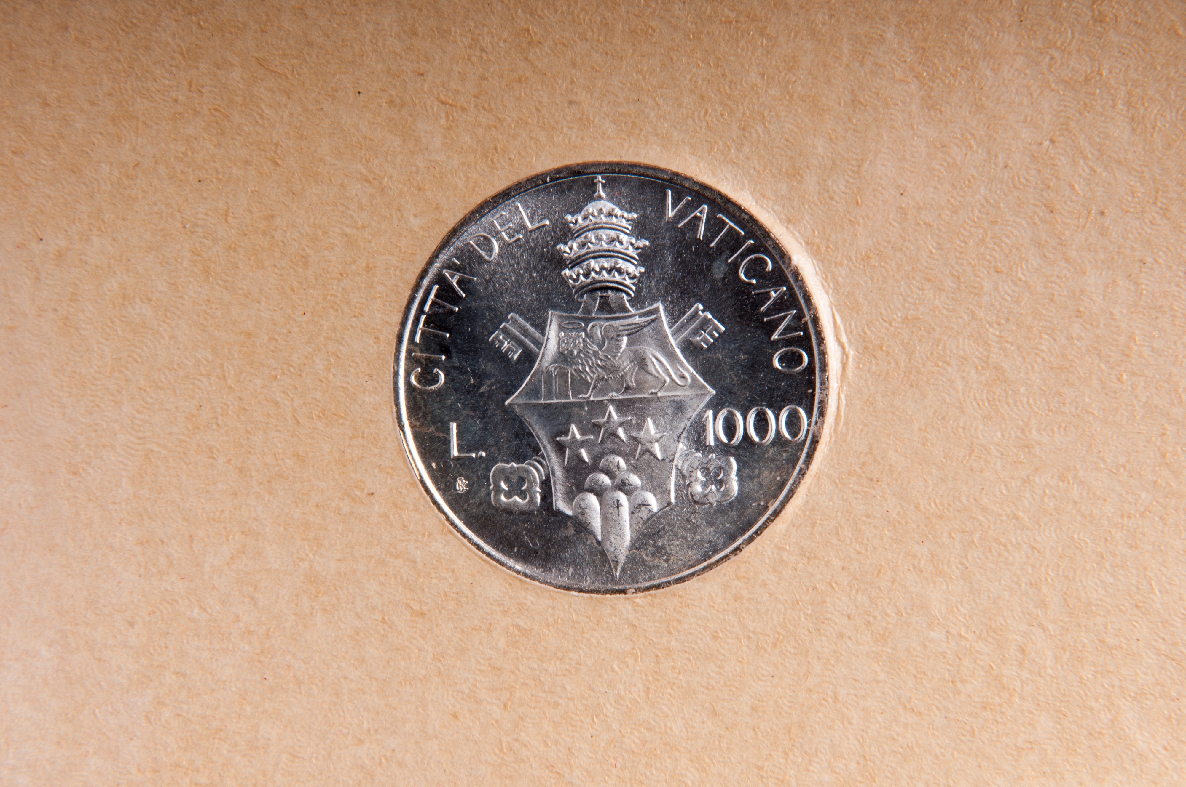 Lotto di quattro monete vaticane: 500 lire in argento sede vacante (1958, 1963, 1978) e 1000 lire...