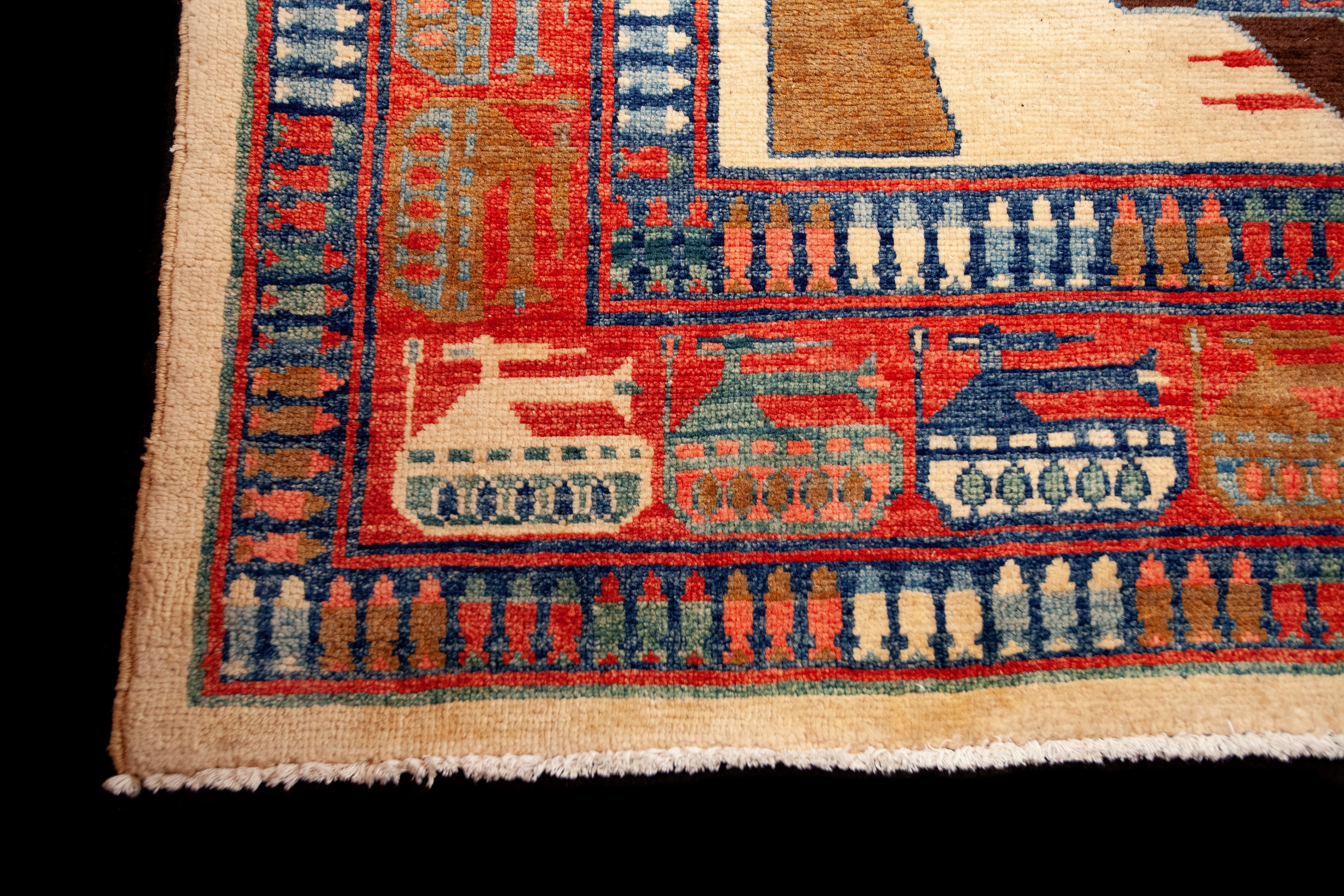 Tappeto annodato afghano con motivi di guerra, inizio XXI secolo, 380x275 cm
