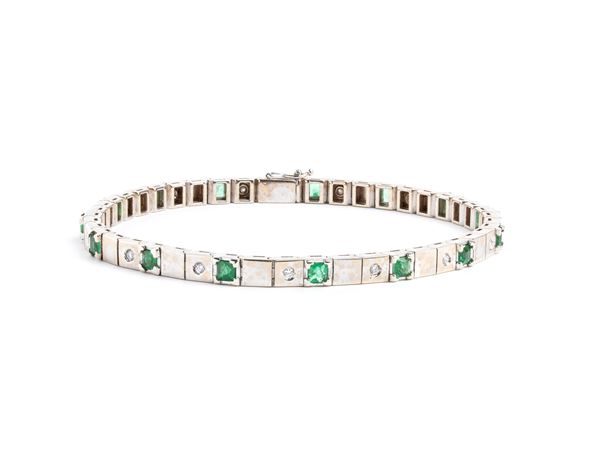 Emeralds and diamonds gold bracelet