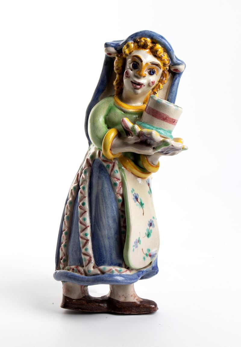 Ragazza portacandela in costume regionale