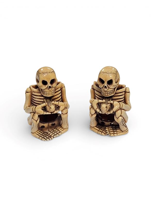 Coppia di sculture in avorio