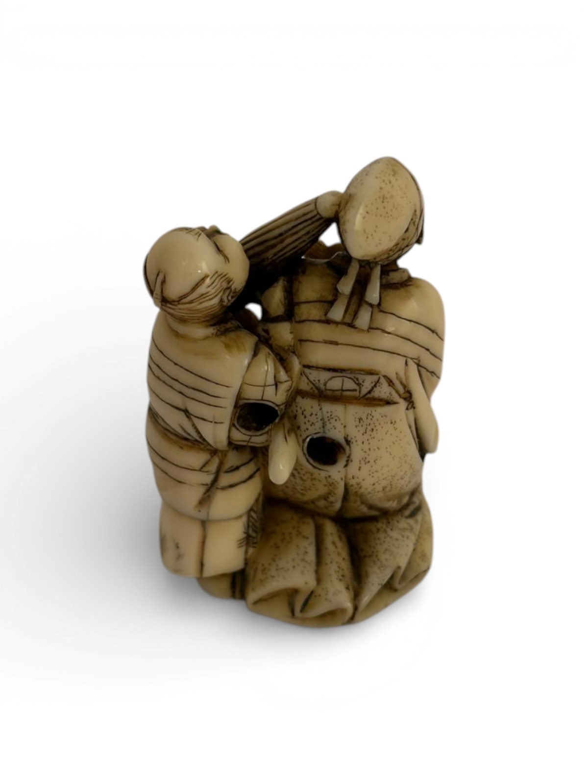 Minpoku, Netsuke in avorio raffigurante attore con assistente, periodo Meiji