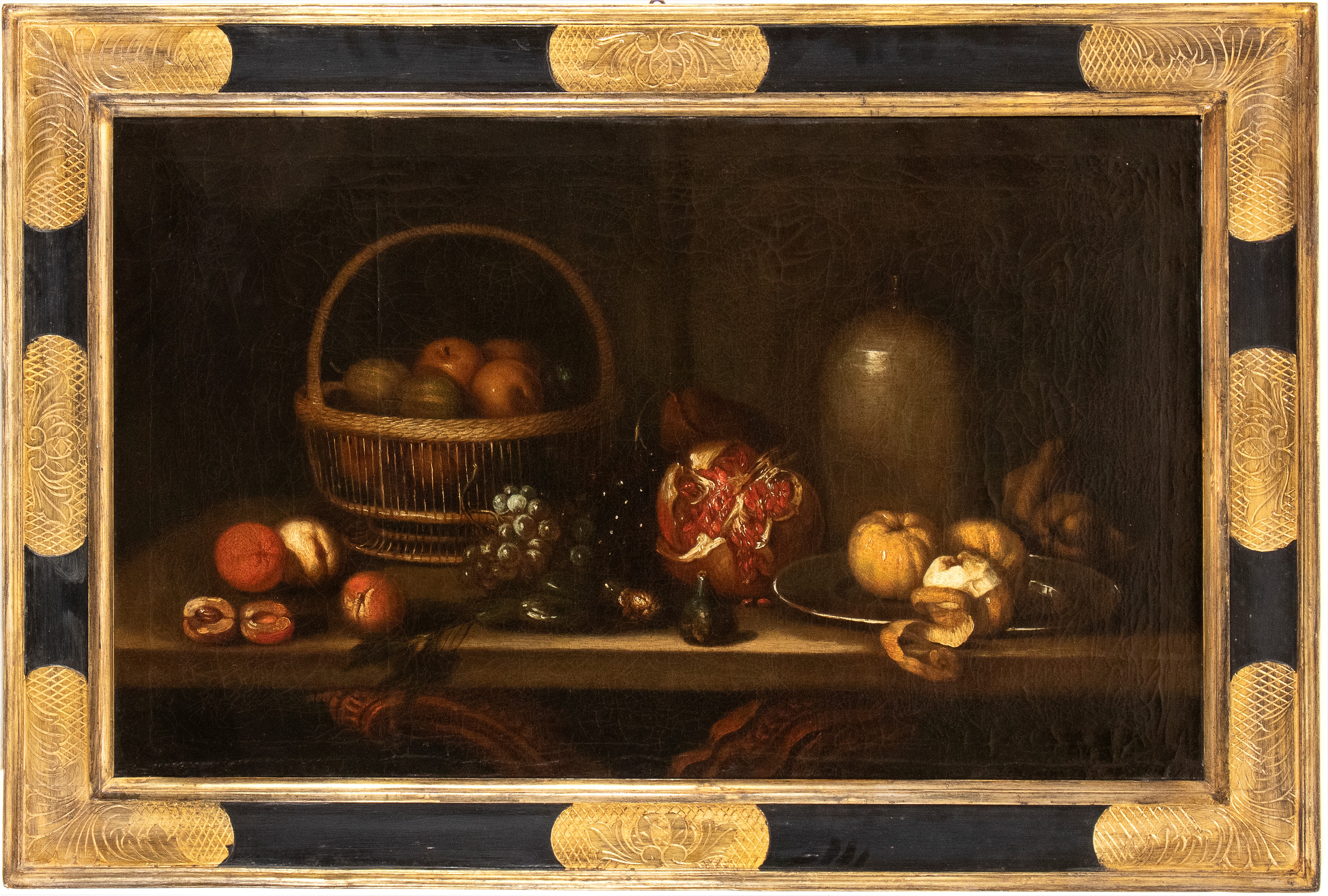 Natura morta con cesto di pomi, melagrane e limoni