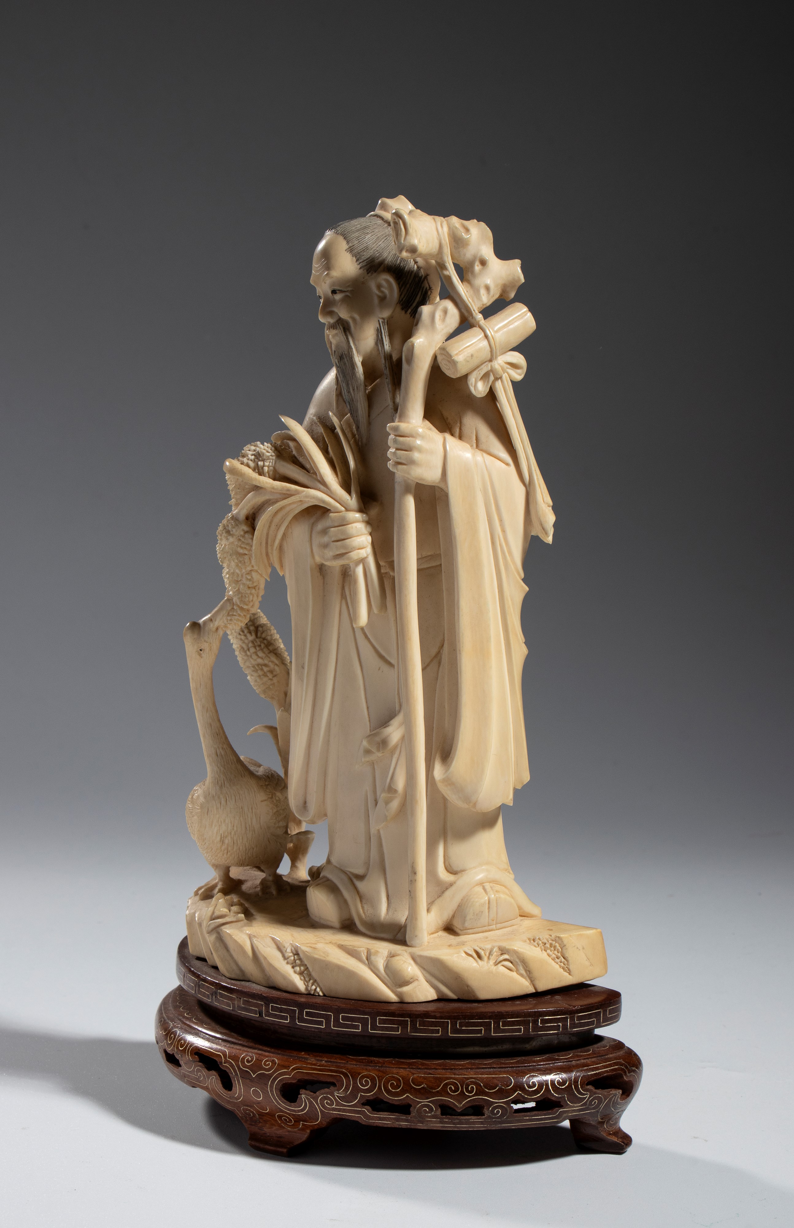 Gruppo figurato in avorio, saggio con oca, dinastia Qing