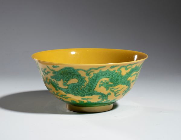 Green enamel dragon bowl with yellow background, China
