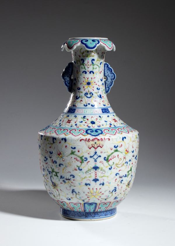 A porcelain vase from the pink family, China