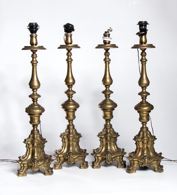 Set of four brass candlesticks