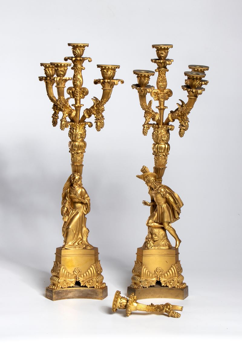 Coppia di candelabri francesi in bronzo dorato