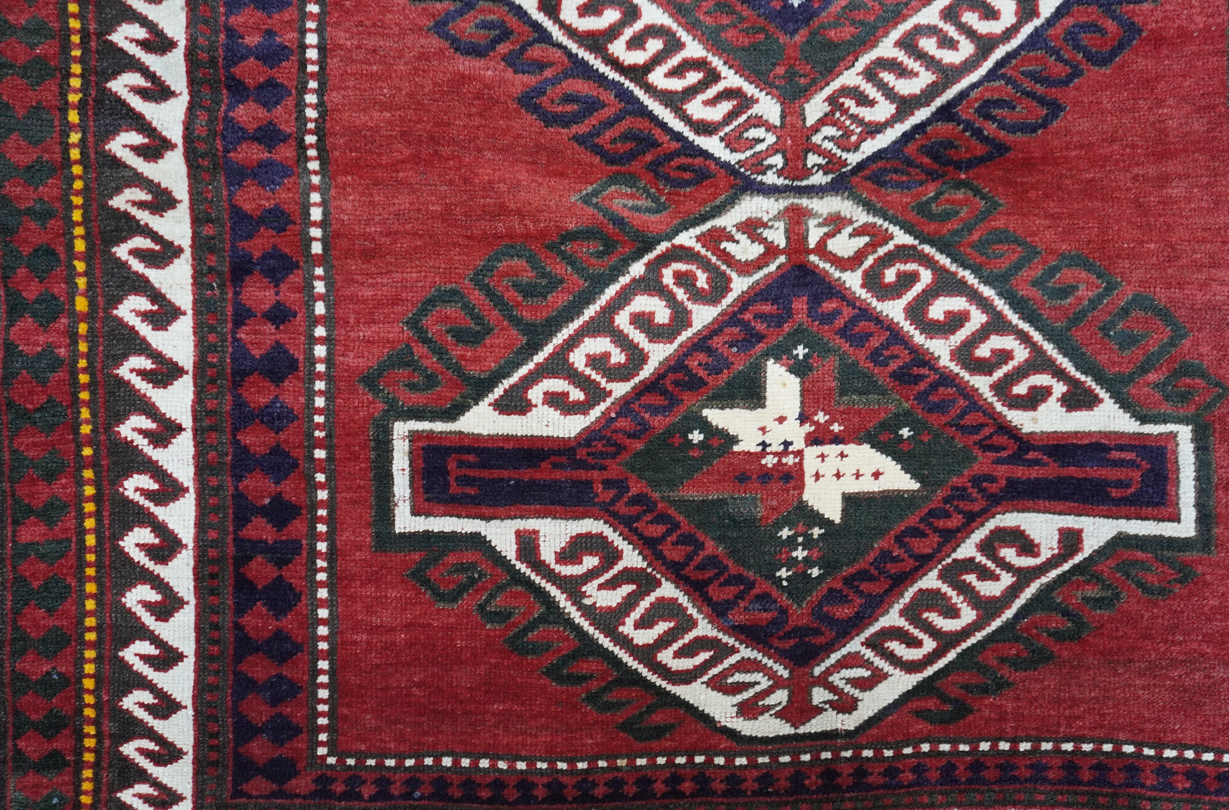 Tappeto Kazak a fondo rosso