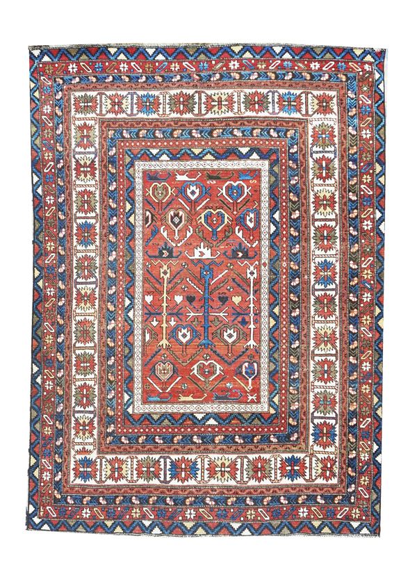 A red background Shirvan rug