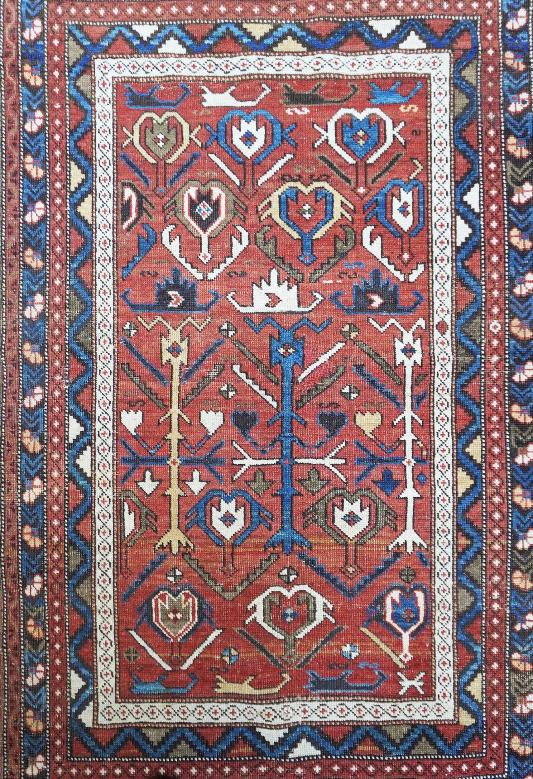 Tappeto Shirvan a fondo rosso