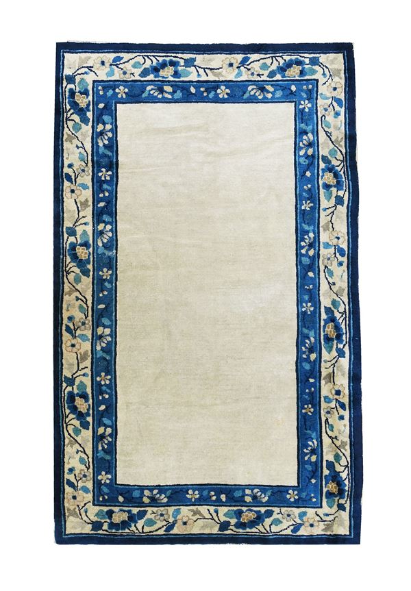 An open field Peking rug