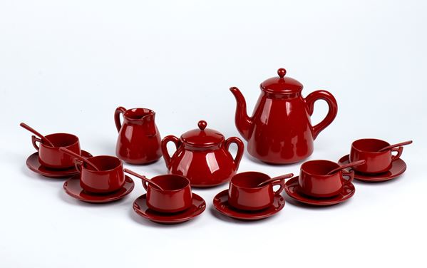 A lacquer coffee service and a porcelain tea service