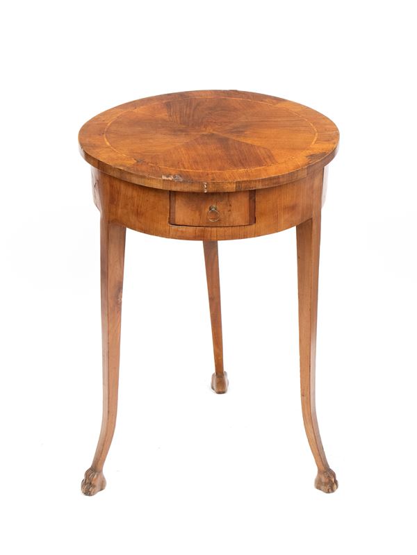 Round walnut side table