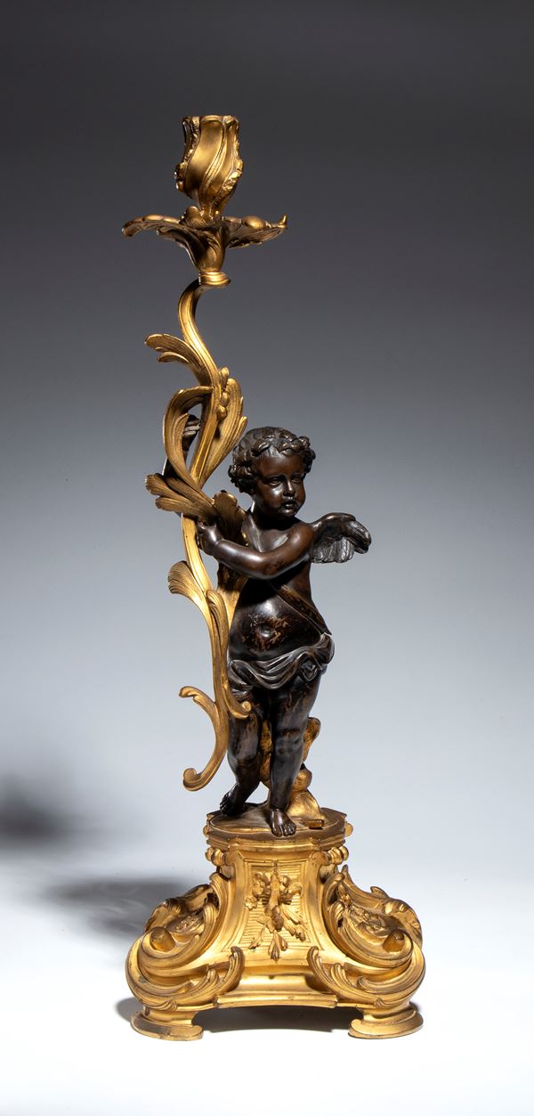 Candleholder shaped like a winged Cupid
