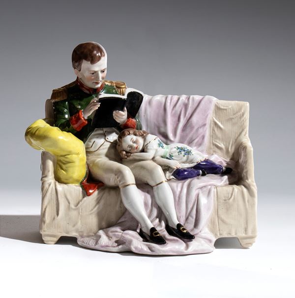 A polychrome porcelain group depicting Napoleon and his son in the Capodimonte style