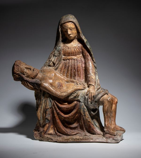 Polychrome stucco sculpture depicting the Pietà