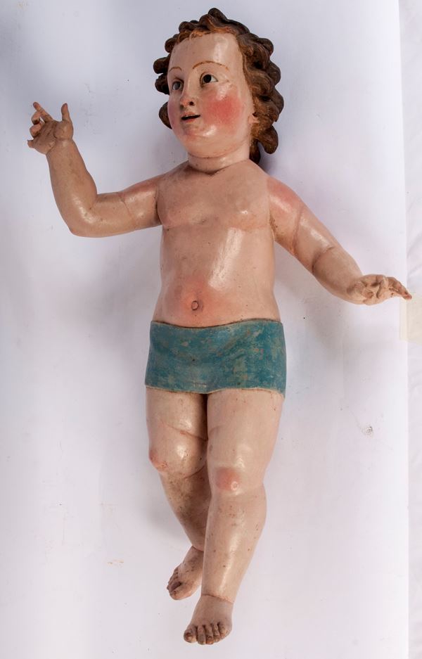 Bambinello, scultura in legno a tutto tondo