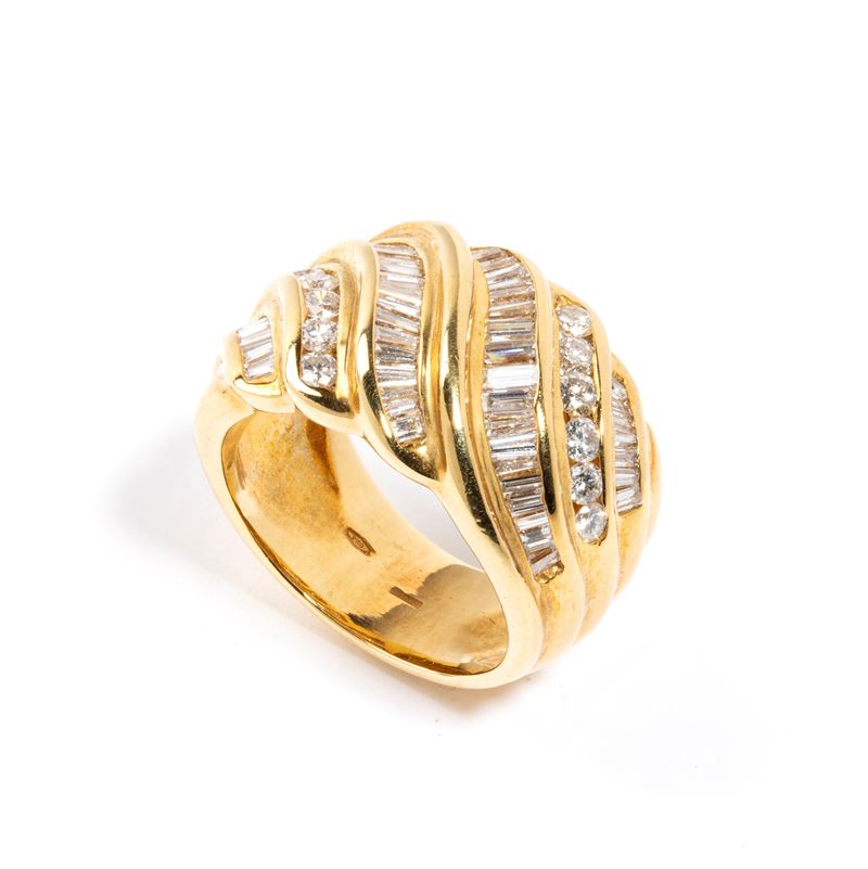 Anello a fascia in oro e diamanti