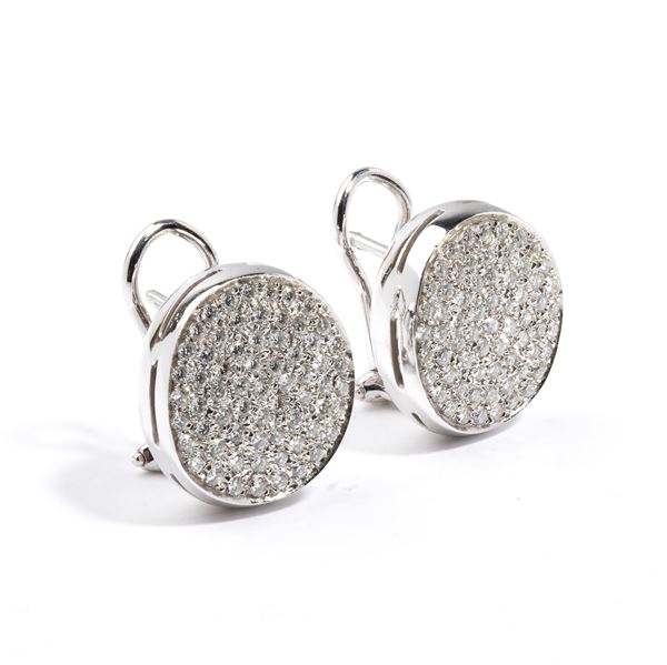 A pair of gold and diamond earrings