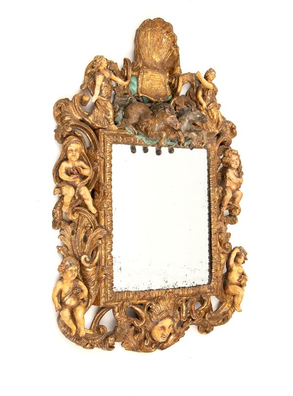 Carved and gilded mirror