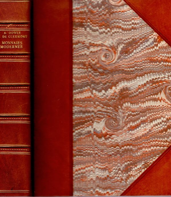 DE CLERMONT Andre - DOWLE Antony - Monnaies modernes de 1789 à nos jours. Fribourg, 1972. pp 319, molte tavole a colori e b\n. Splendida  legatura in \pelle con angoli  in cofanetto da amatore, ottimo stato