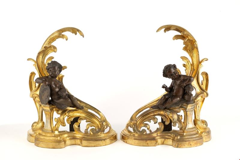 Alari da camino in bronzo dorato