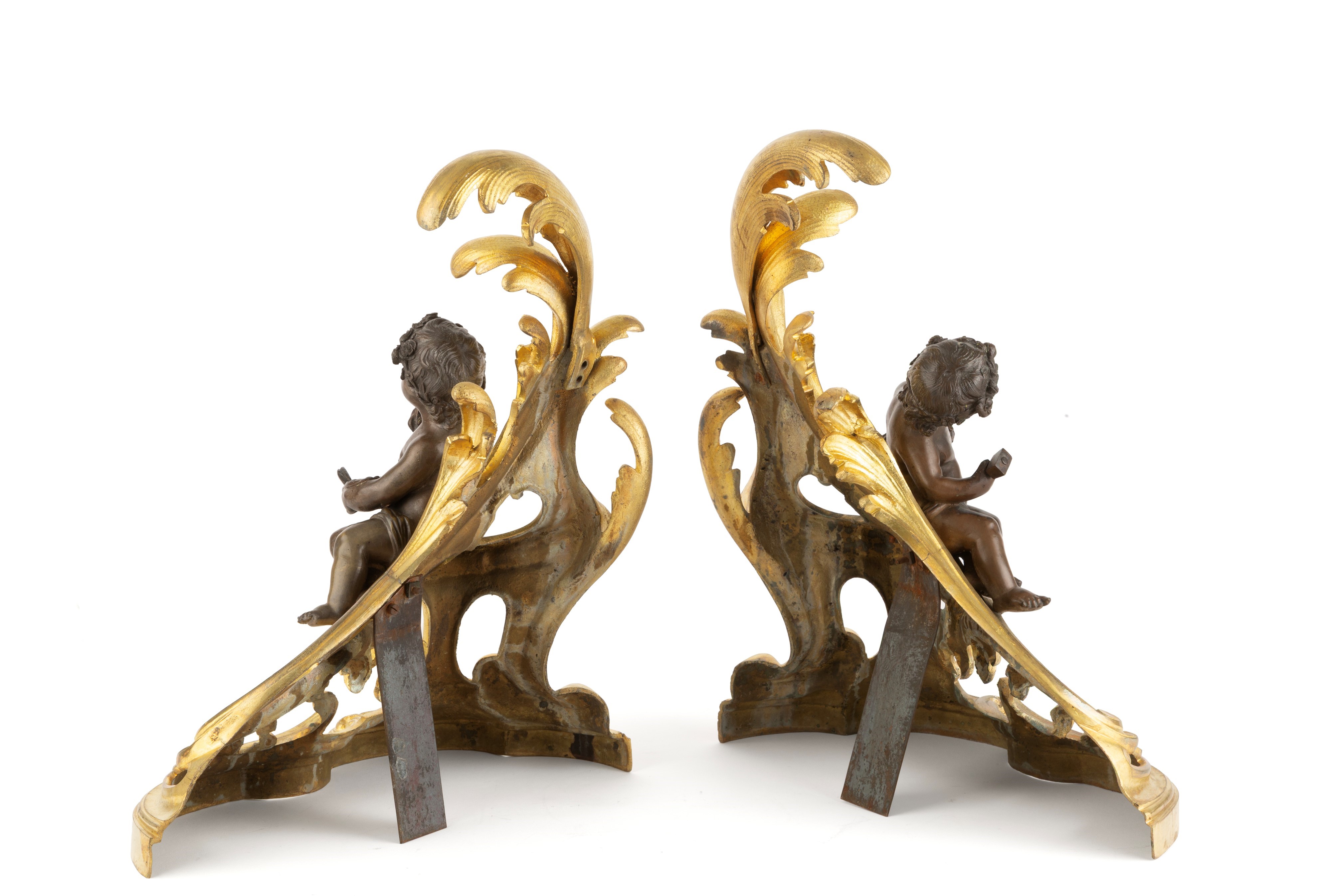 Alari da camino in bronzo dorato