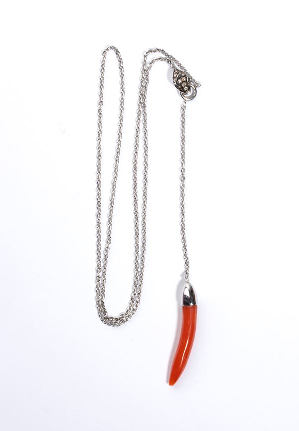 Necklace with a coral pendant