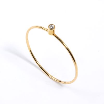 Anello in oro giallo con diamante