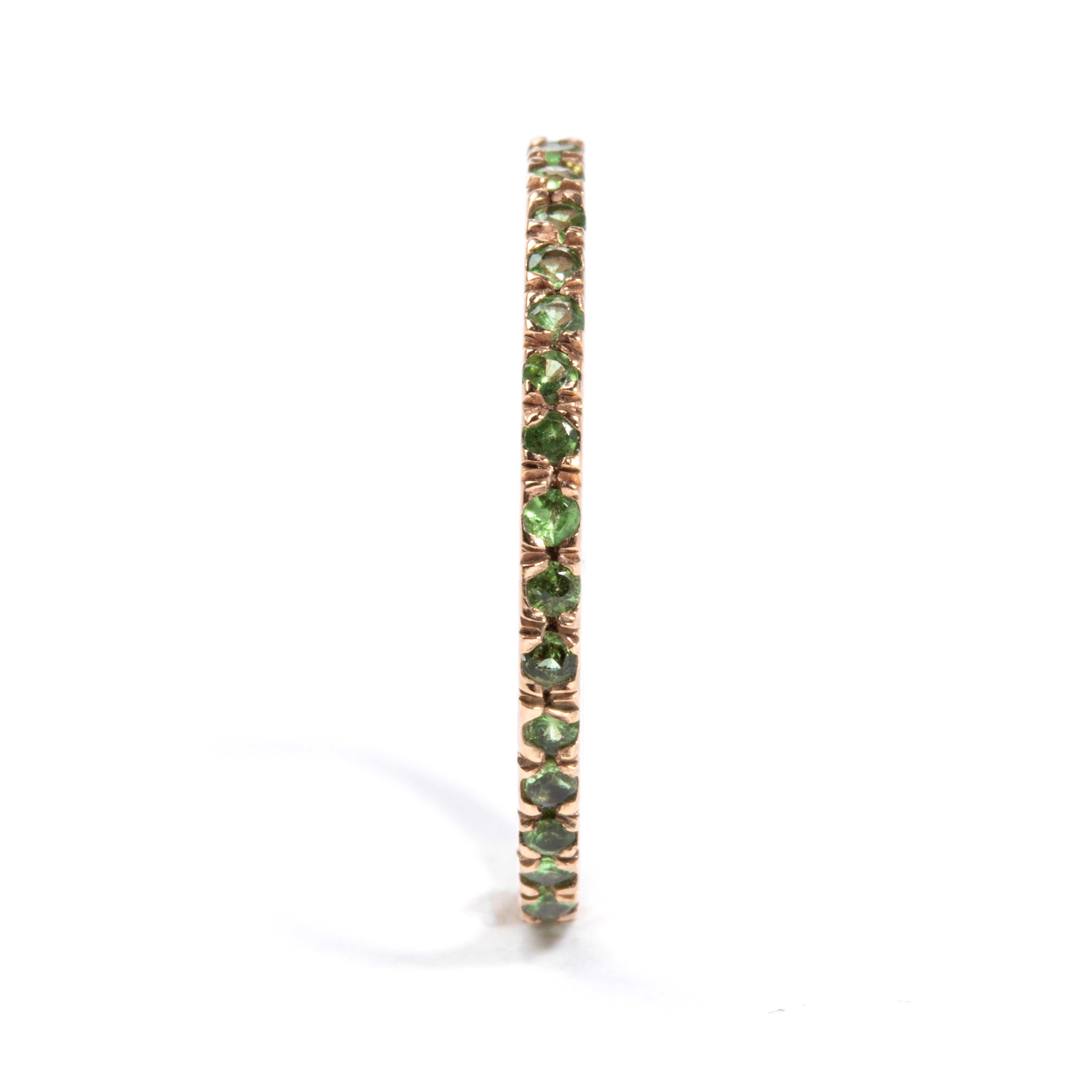 Anello in oro rosa 8k con linea di tsavoriti