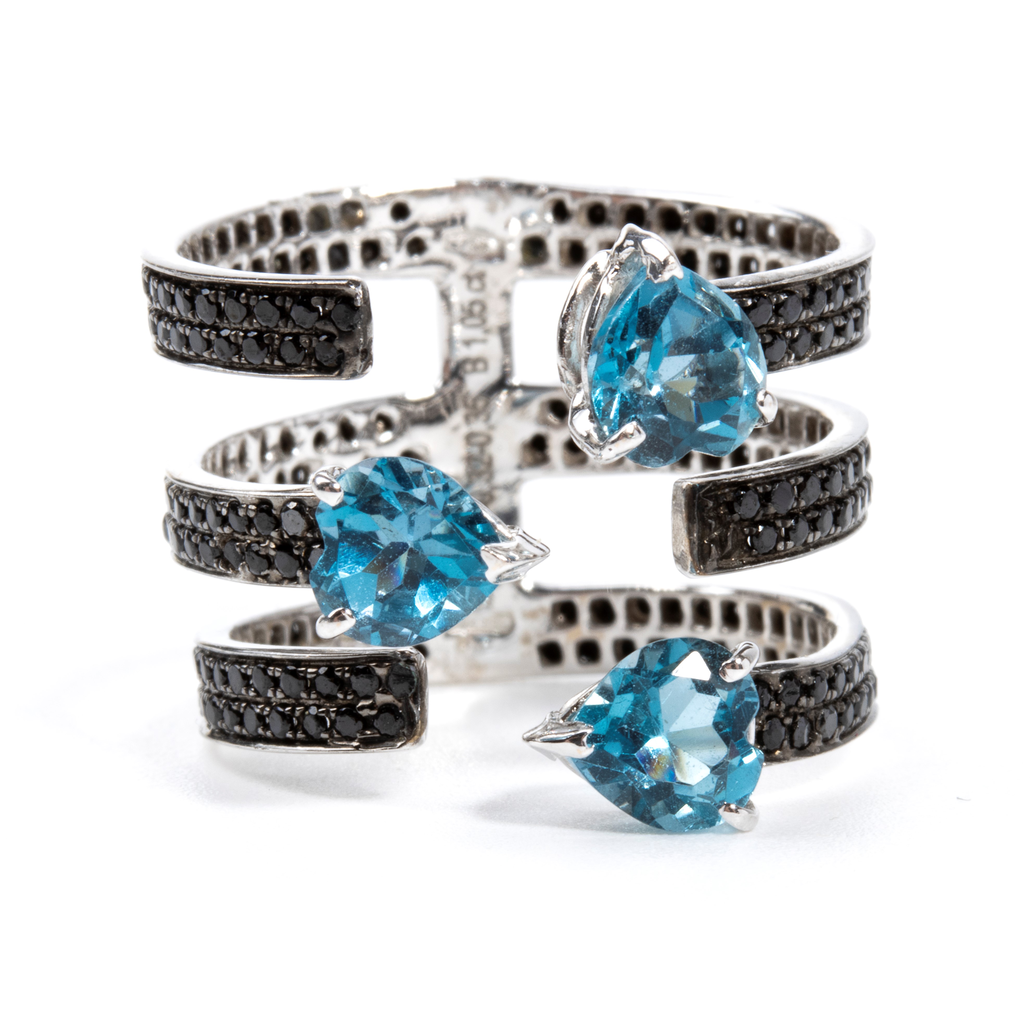 ANELLO IN ORO CON DIAMANTI NERI E TOPAZI AZZURRI