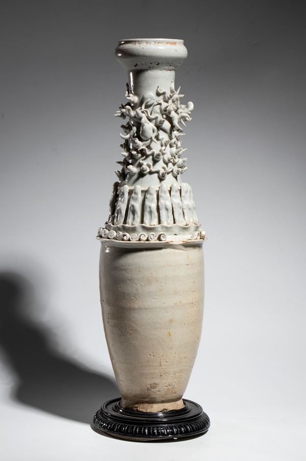 Large pale blue Qingbai glazed porcelain funerary vase, cylindrical body decorated with applied figures. China, Song Dynasty, 10th-12th century.