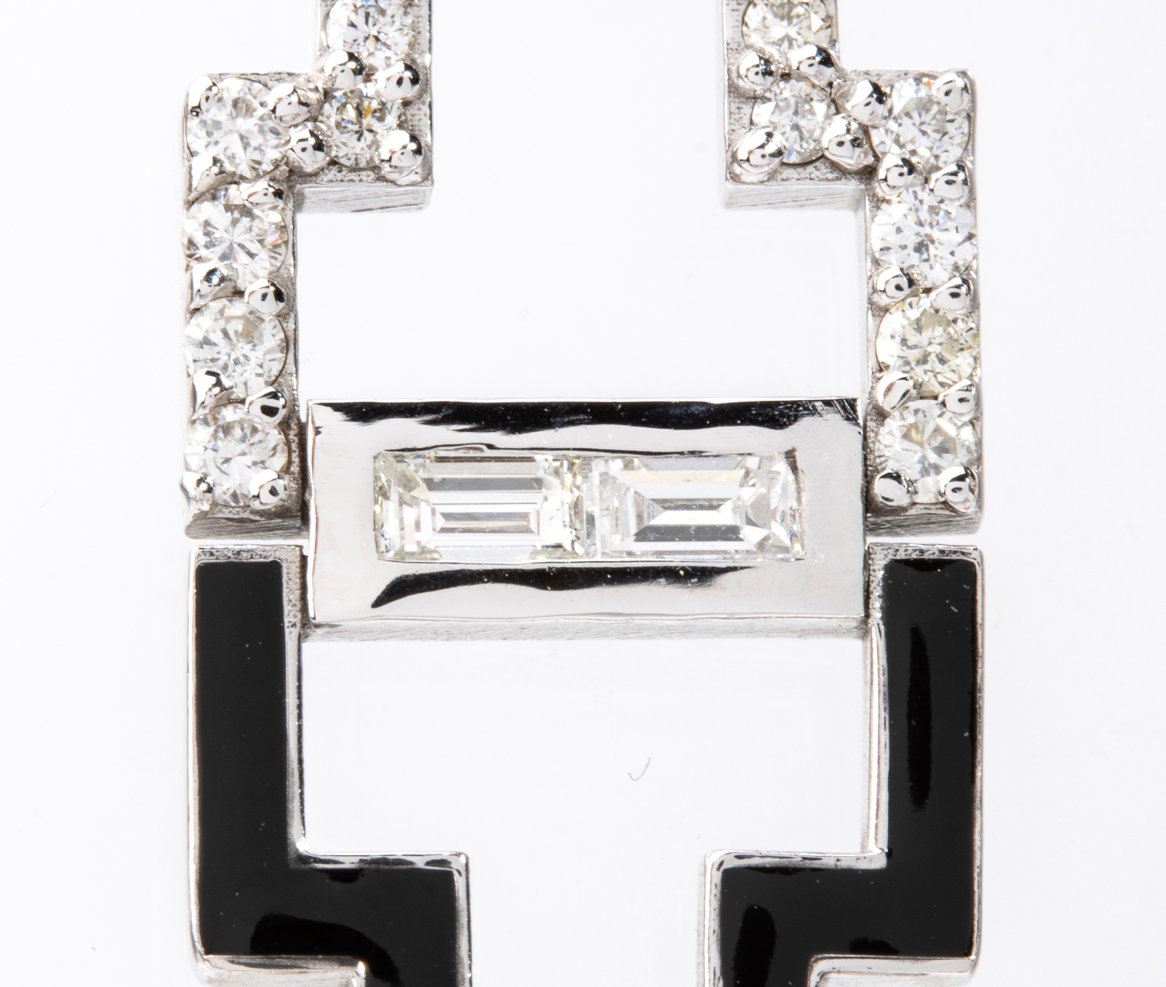 Orecchini pendenti in oro e diamanti