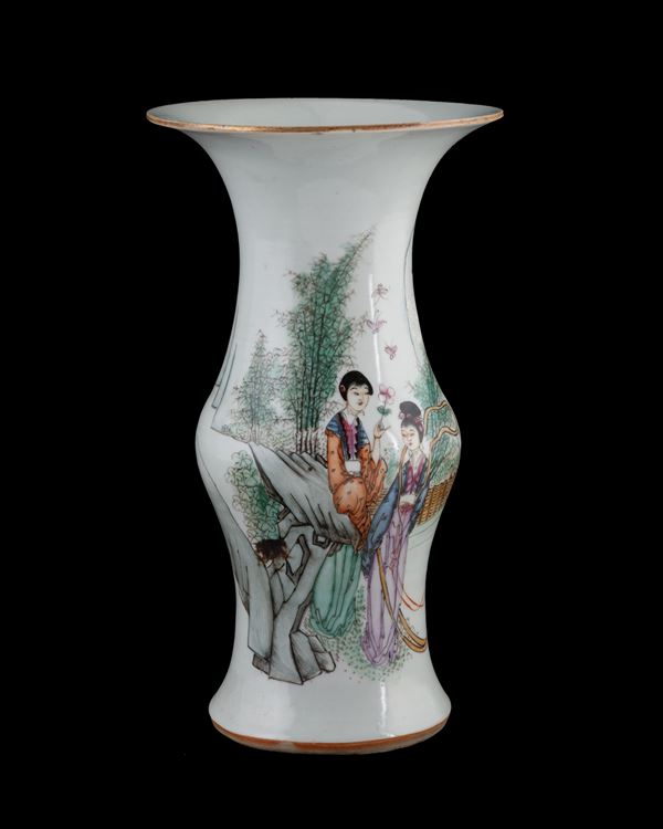 A baluster-shaped painted porcelain vase depicting female figures in a naturalistic landscape. China, 20th century.