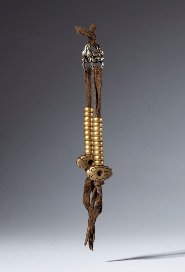 A pair of ornamental mala counters in copper alloy. Tibet, 19th century