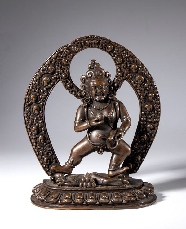 Copper alloy statue depicting Bidhisattva Jambhala. God of material and spiritual health in Himalayan Buddhism. Tibet, 19th century.