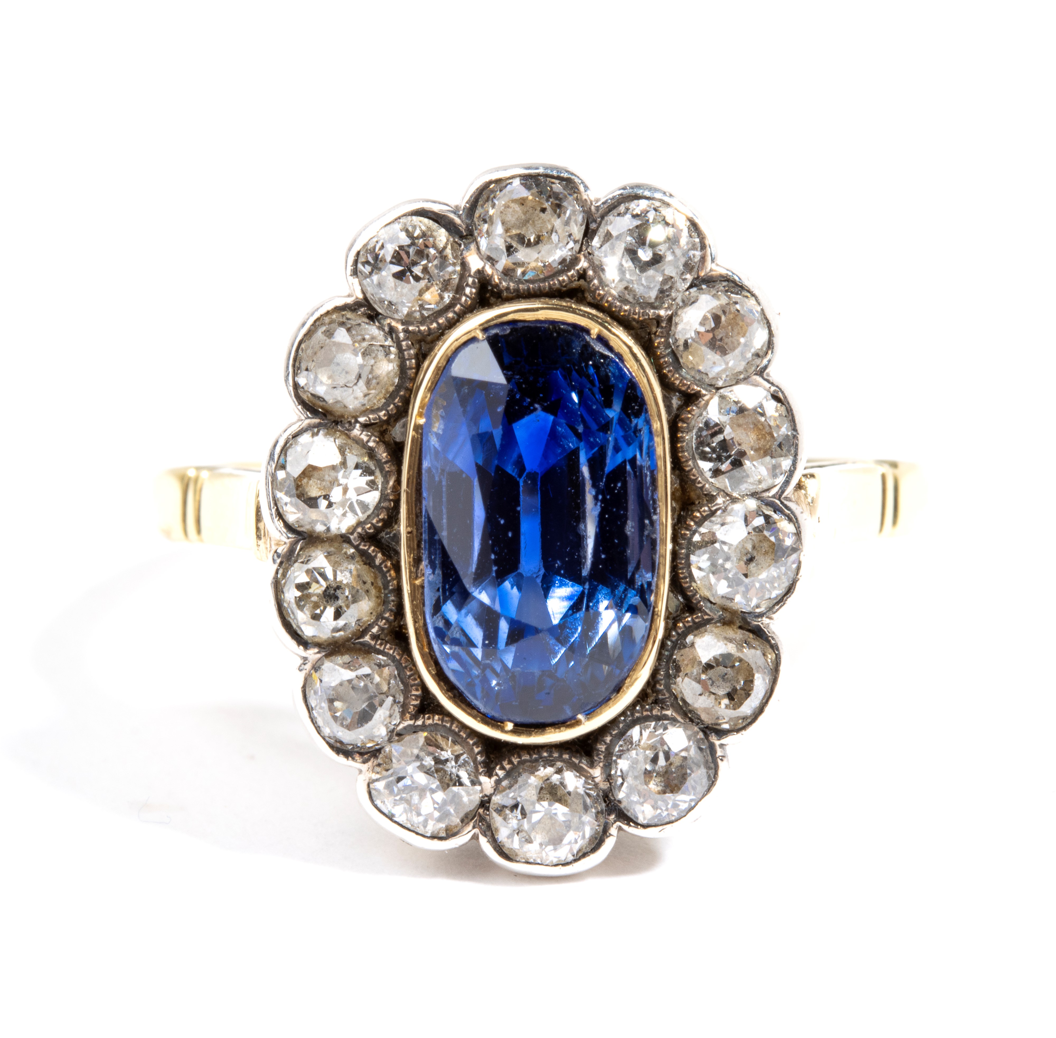 Anni ’20, Anello in oro e argento a fiore con zaffiro Ceylon e diamanti