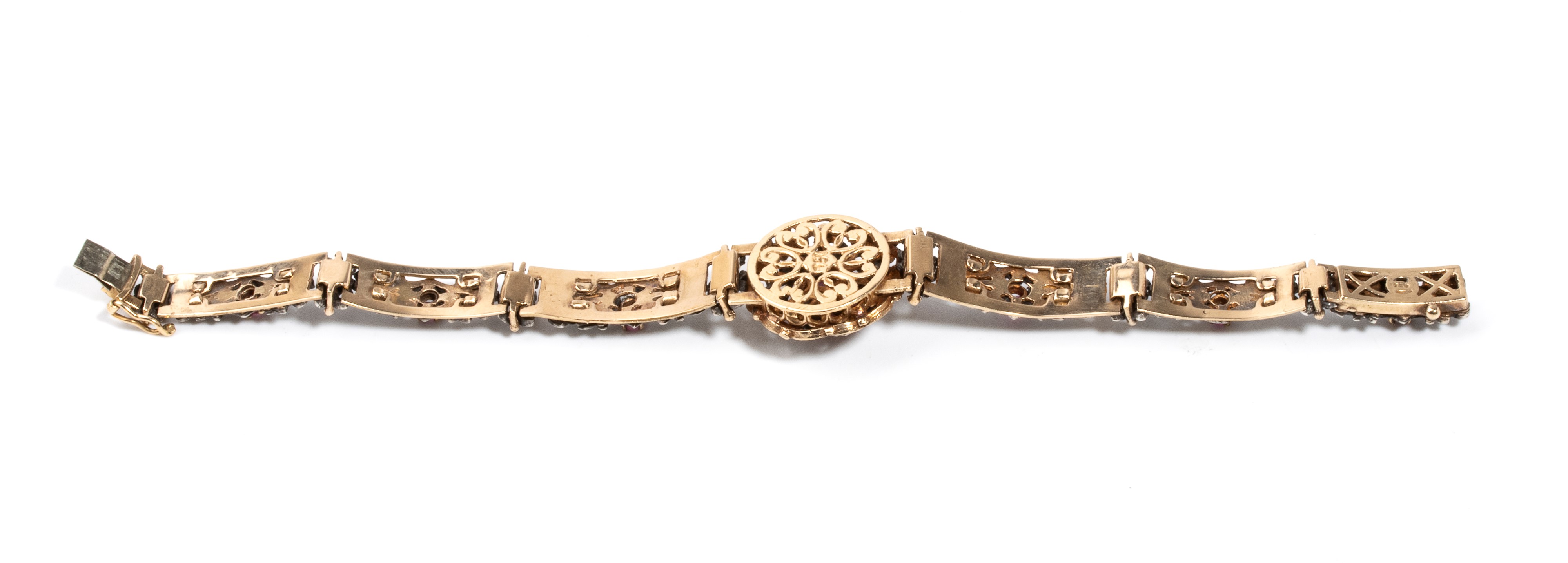 Bracciale in oro giallo 18k e argento, con inserti floreali e rubini
